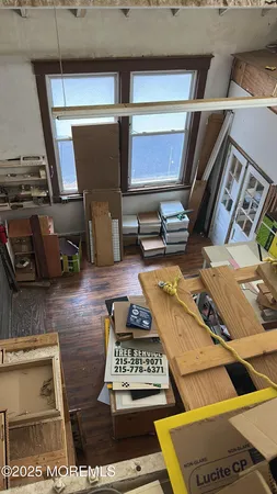 a room with microwave and furniture