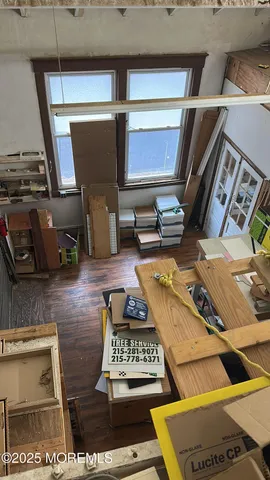 a view of living room with furniture and rug