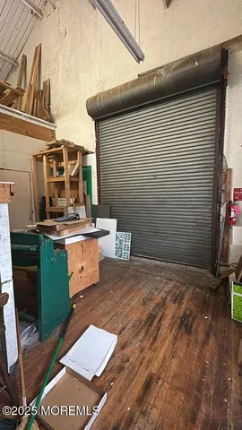 a view of a backyard with chairs and dishwasher