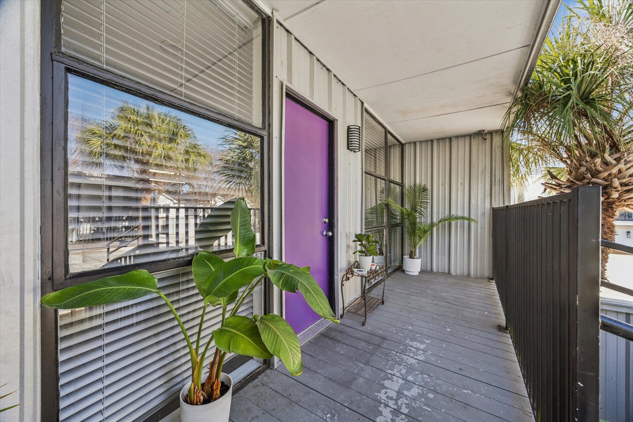 1901 Whitney Street, Unit 7 Houston, TX 77006 - Photo 8 of 10 a view of a house with a flower garden