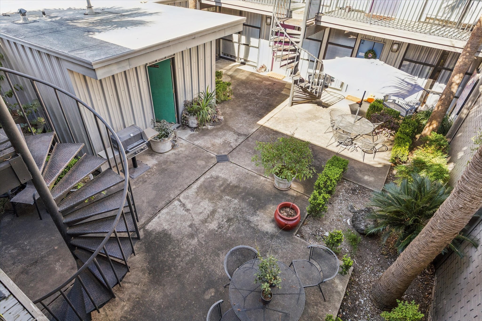 1901 Whitney Street, Unit 7 Houston, TX 77006 - Photo 9 of 10 an aerial view of a house with backyard