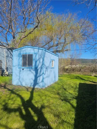 a view of a yard with an outdoor space