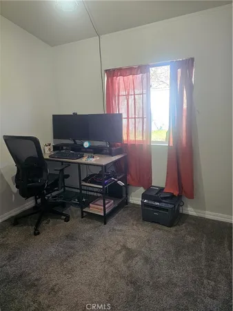 a room with a desk and chair