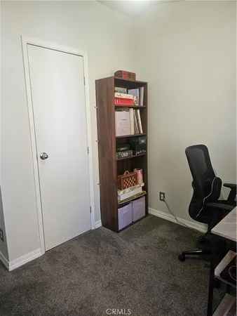a utility room with closet dryer and washer