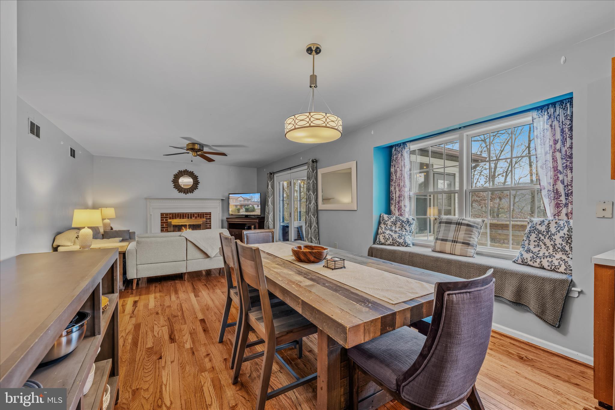 2509 Highland Ridge Road Berkeley Springs, WV 25411 - Photo 17 of 68 a view of a dining room with furniture window and outside view