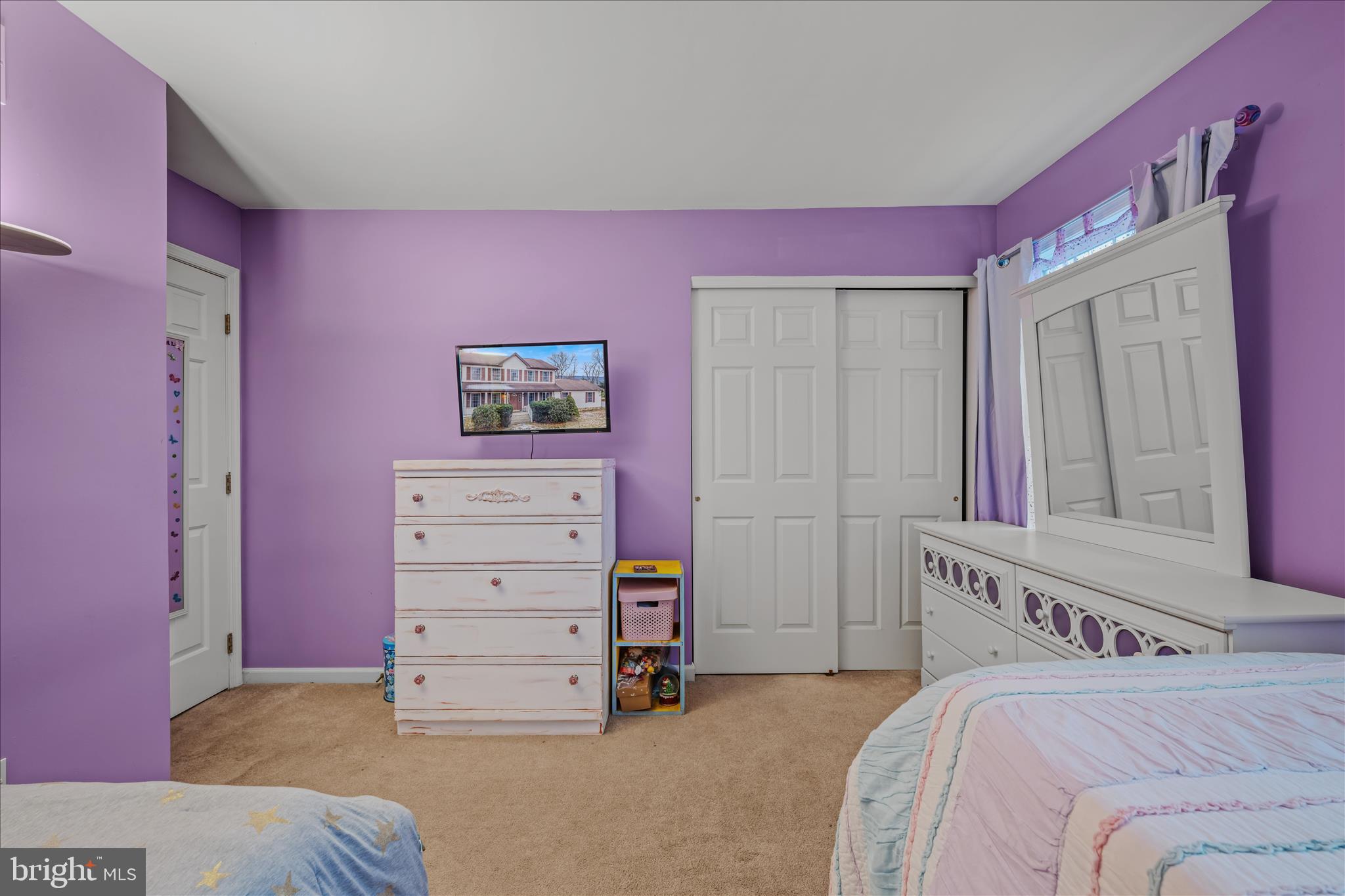 2509 Highland Ridge Road Berkeley Springs, WV 25411 - Photo 39 of 68 a bedroom with a bed and a window