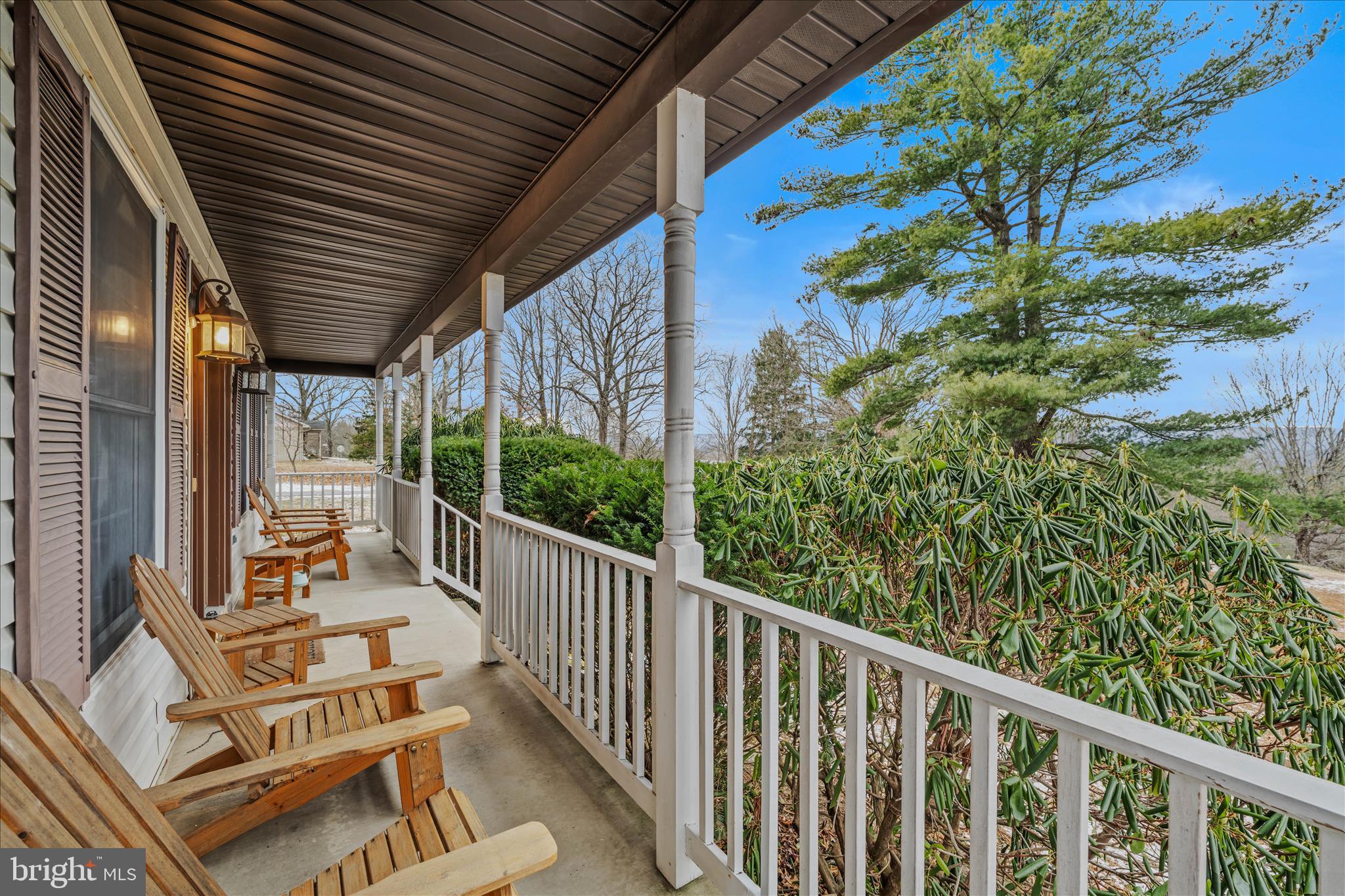 2509 Highland Ridge Road Berkeley Springs, WV 25411 - Photo 4 of 68 a view of balcony with wooden floor and outdoor seating