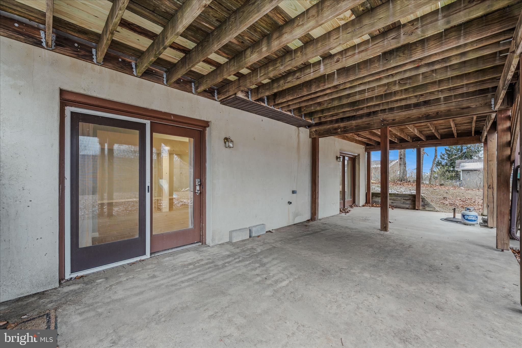 2509 Highland Ridge Road Berkeley Springs, WV 25411 - Photo 51 of 68 a view of an empty room with glass door