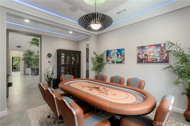 a large kitchen with kitchen island a large window in it