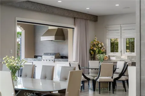 a stove top oven sitting inside of a kitchen