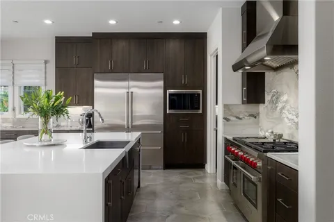 a living room with furniture fireplace and flat screen tv