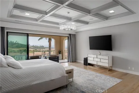 a bathroom with a tub a sink and mirrors