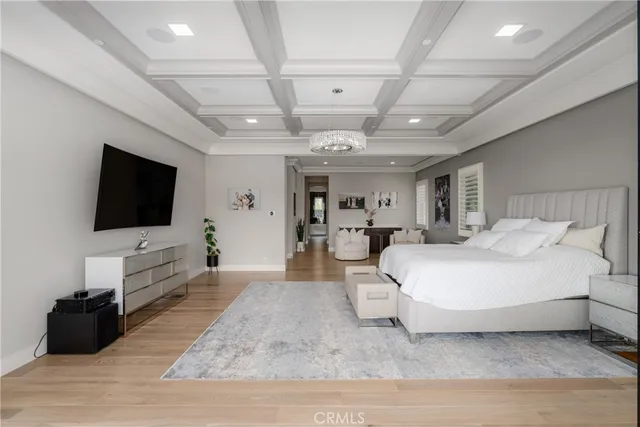 a large bathroom with a large tub and sink