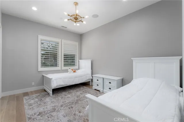 an aerial view of residential houses and outdoor space