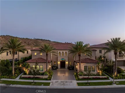 a view of a living room and balcony