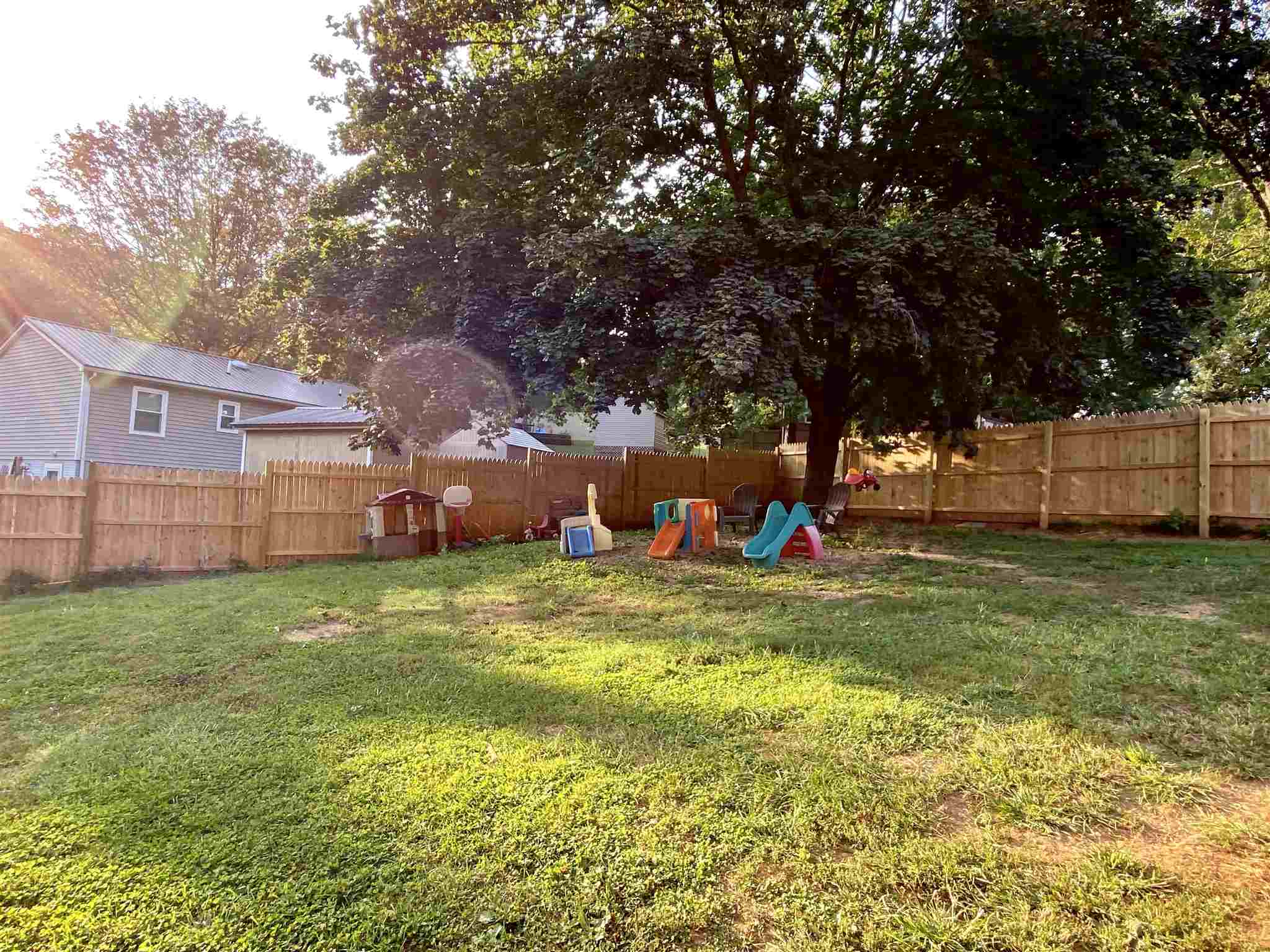 116 Robinhood Road Staunton, VA 24401 - Photo 32 of 34 a backyard of a house with table and chairs