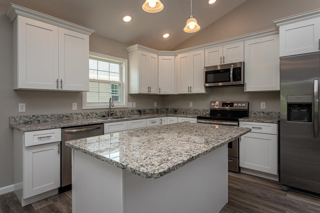 17030 Mt Pleasant Road Elkton, VA 22827 - Photo 7 of 22 a kitchen with stainless steel appliances granite countertop a sink a stove and a refrigerator