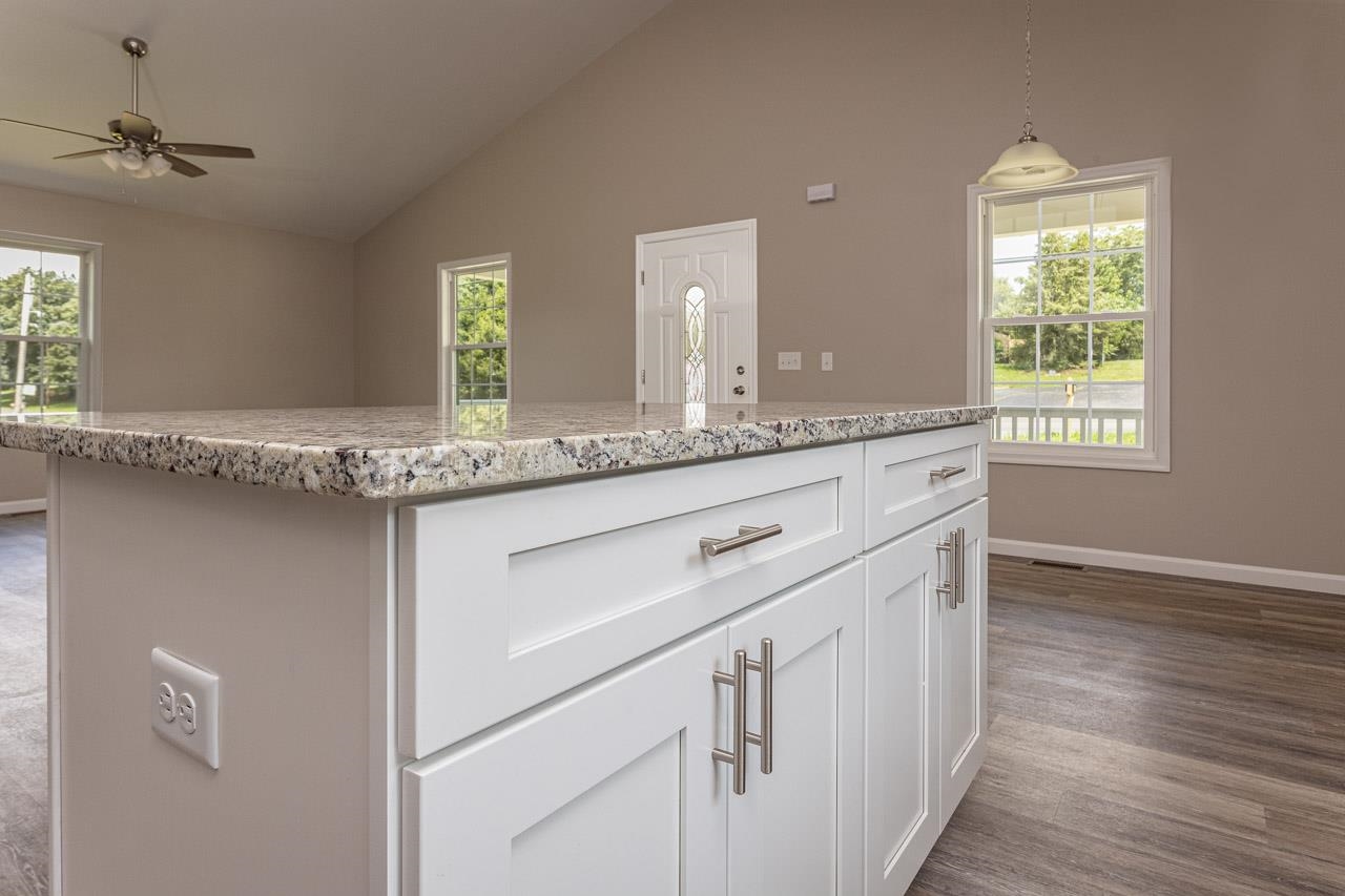 17030 Mt Pleasant Road Elkton, VA 22827 - Photo 9 of 22 a bathroom with a granite countertop sink and a mirror