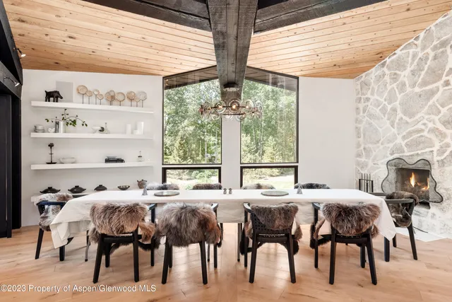 a bedroom with furniture and windows