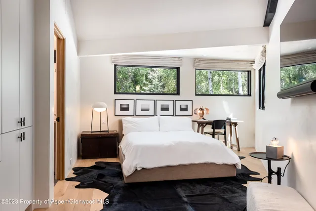 a bathroom with a bathtub and a sink