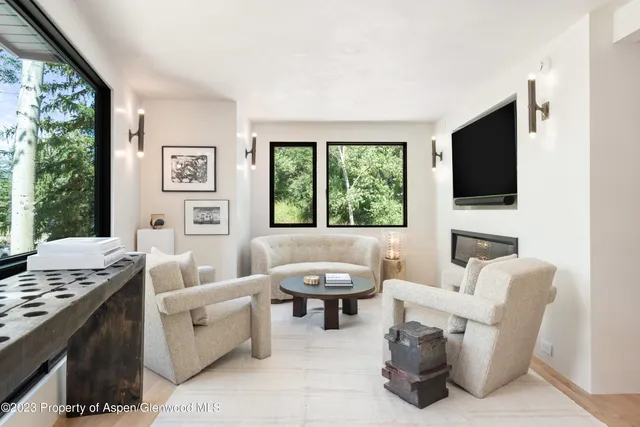 a large room with lots of gym equipment