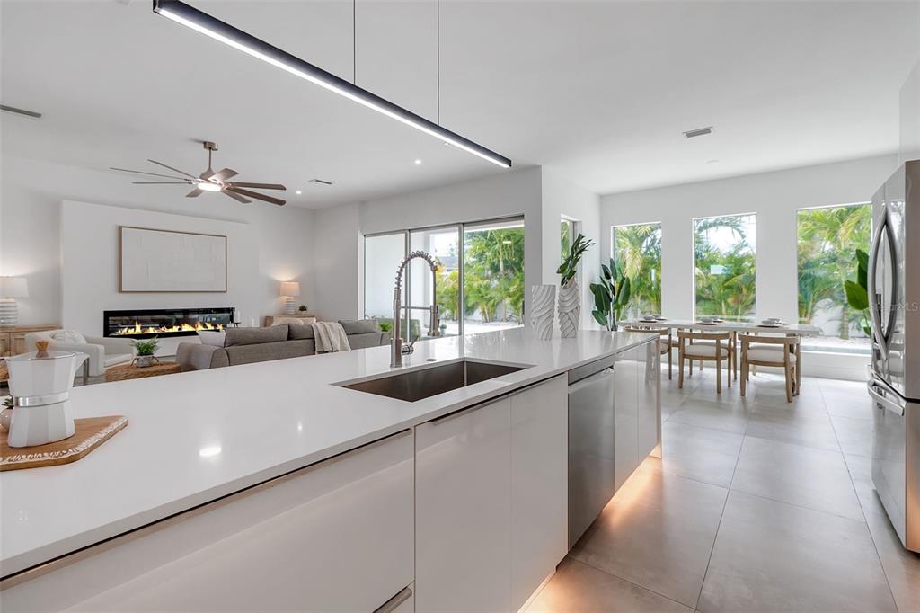 2532 Fruit Tree Drive Sarasota, FL 34239 - Photo 12 of 38 a large white kitchen with a large window