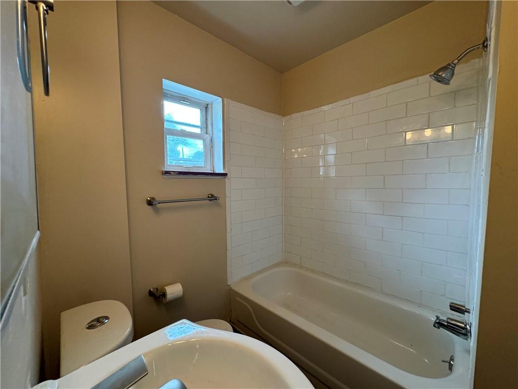 522 Cubbage Street Carnegie, PA 15106 - Photo 18 of 22 a bathroom with a granite countertop bathtub shower sink vanity and toilet