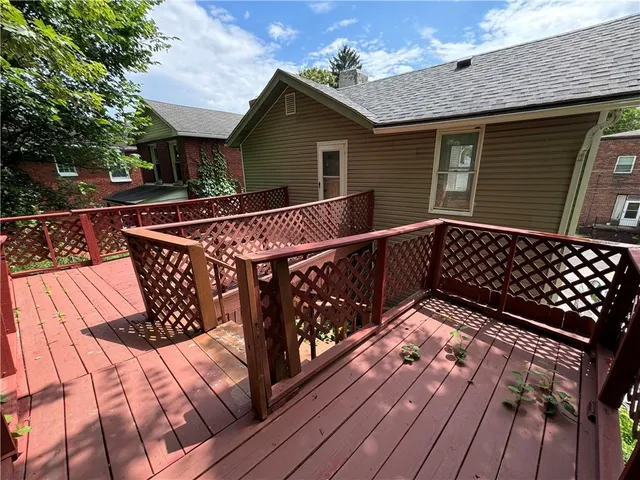 a view of wooden roof deck