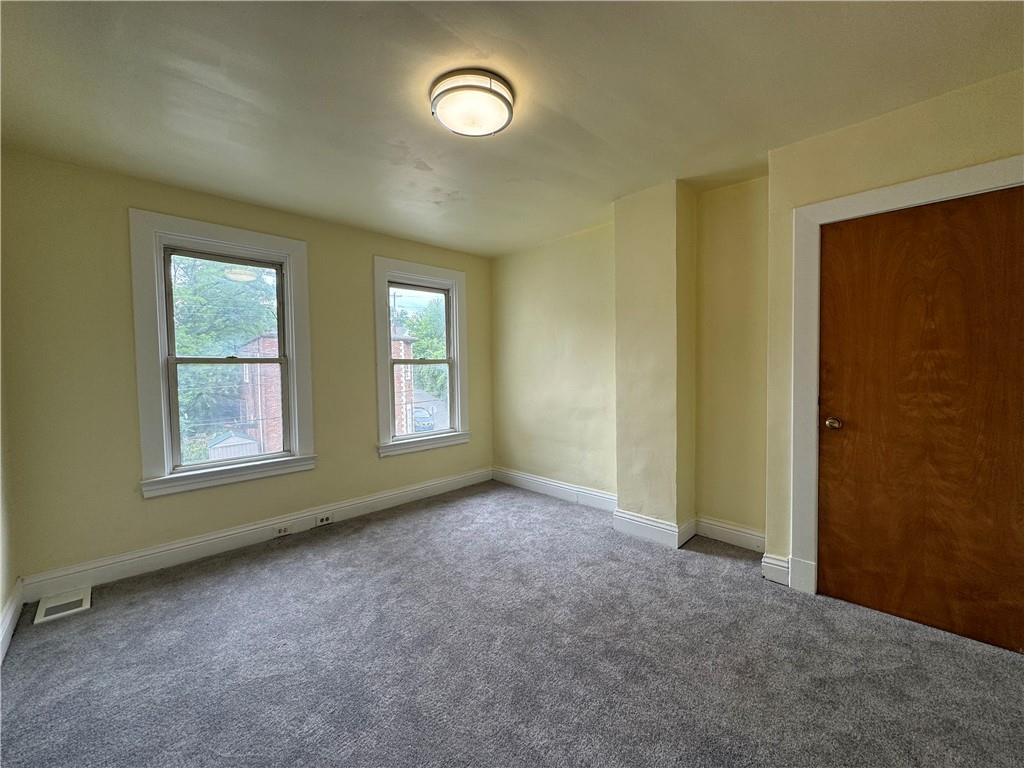 522 Cubbage Street Carnegie, PA 15106 - Photo 7 of 22 an empty room with windows