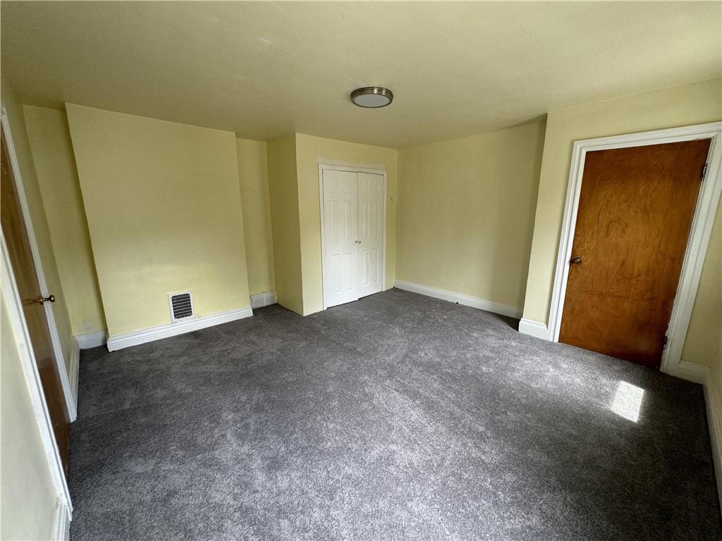 522 Cubbage Street Carnegie, PA 15106 - Photo 9 of 22 a view of an empty room and a window