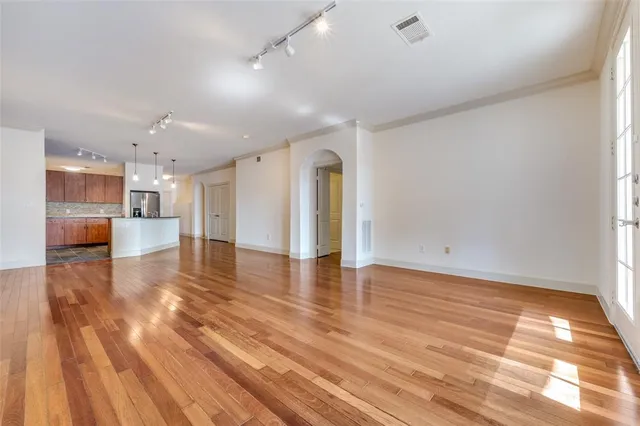 a view of a kitchen with a dishwasher and cabinets