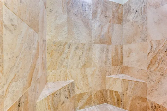 a bathroom with a shower curtain