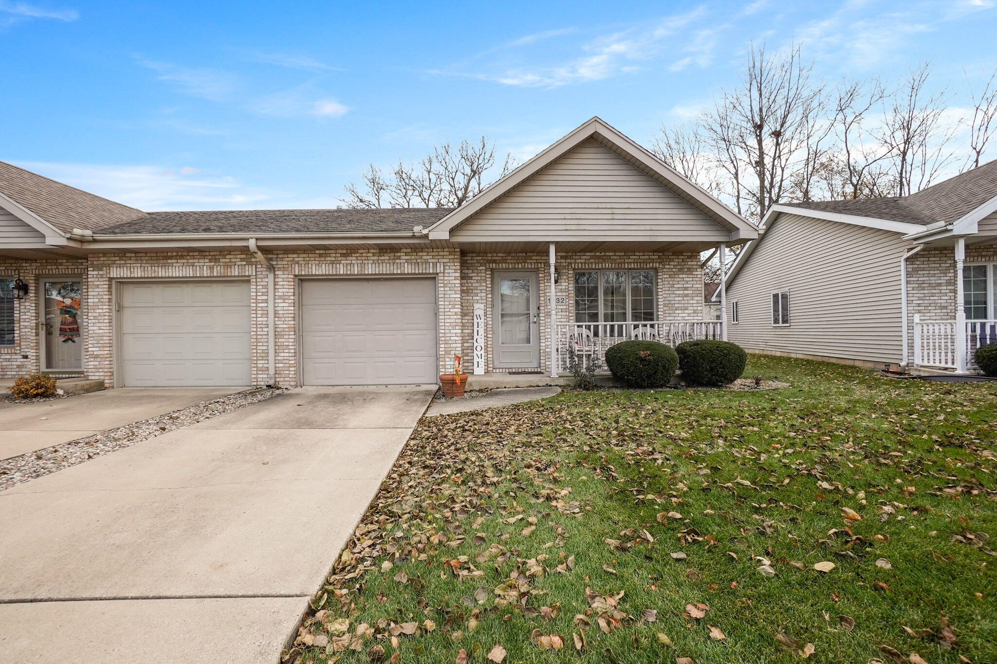 1932 Church Street Dyer, IN 46311 - Photo 1 of 20 a front view of a house with a yard and garage
