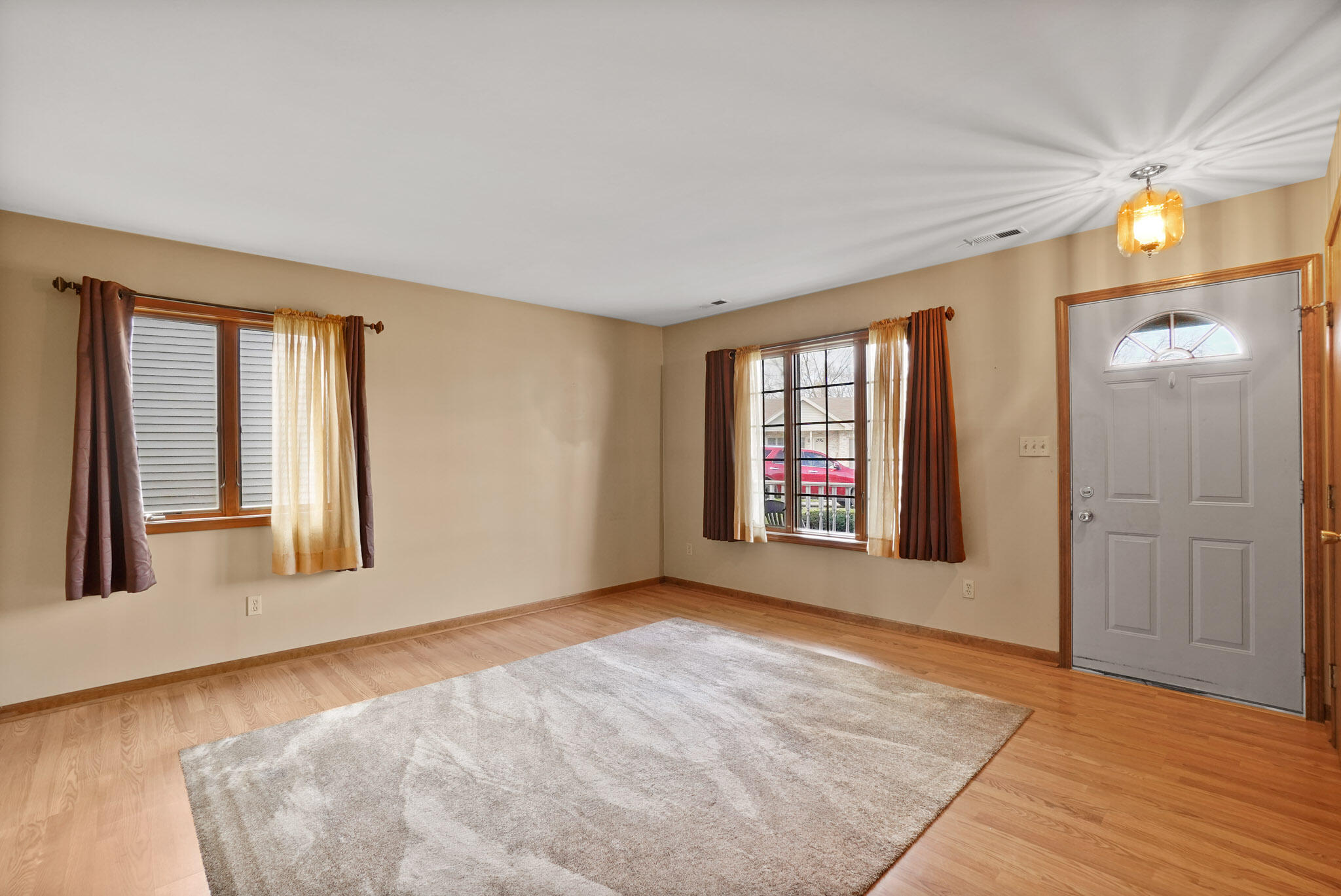 1932 Church Street Dyer, IN 46311 - Photo 3 of 20 a view of an empty room with a window