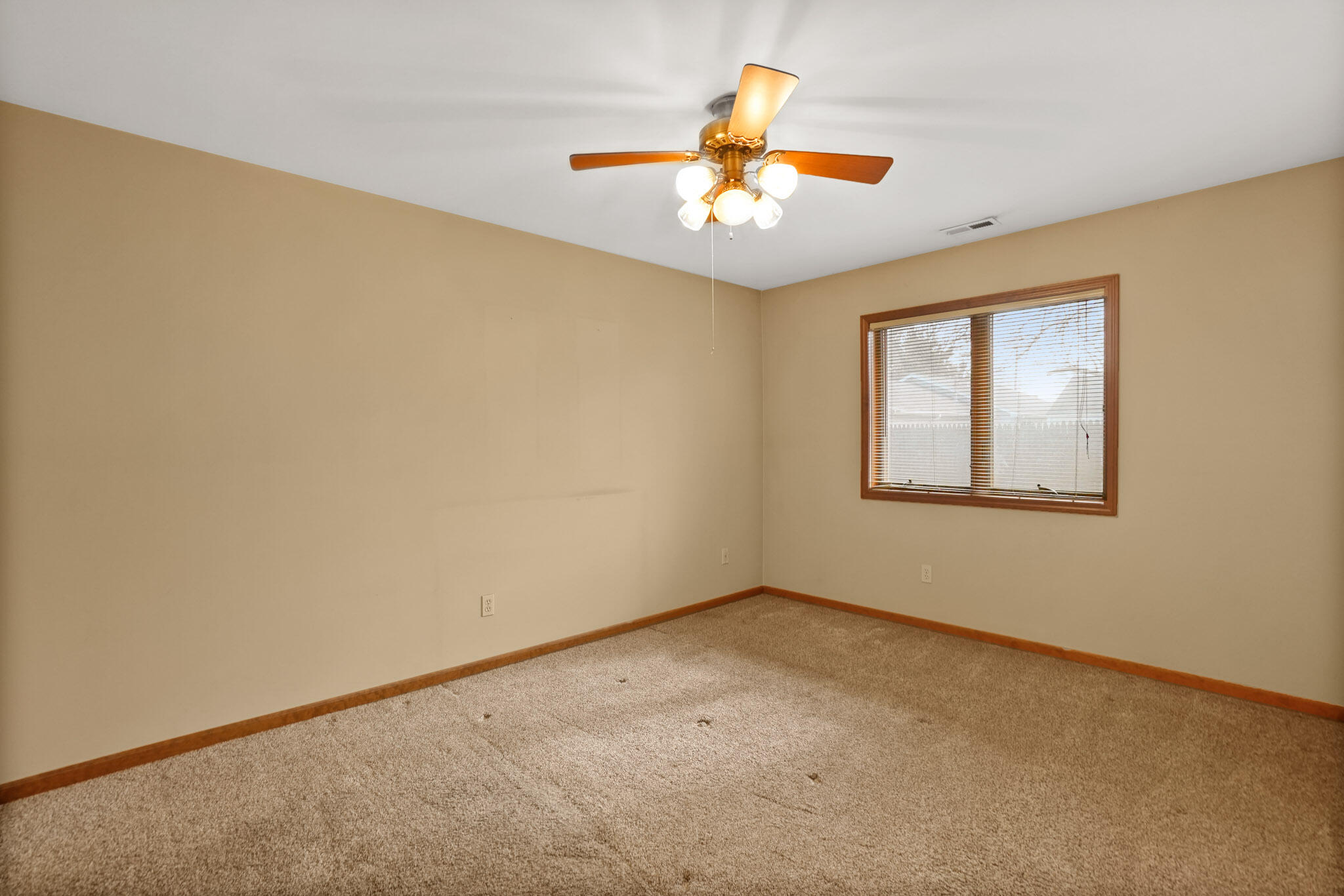 1932 Church Street Dyer, IN 46311 - Photo 10 of 20 an empty room with a window