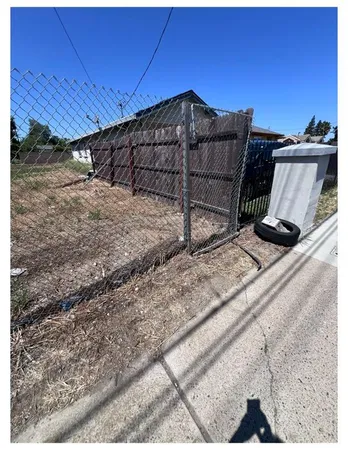 a view of a backyard of a house