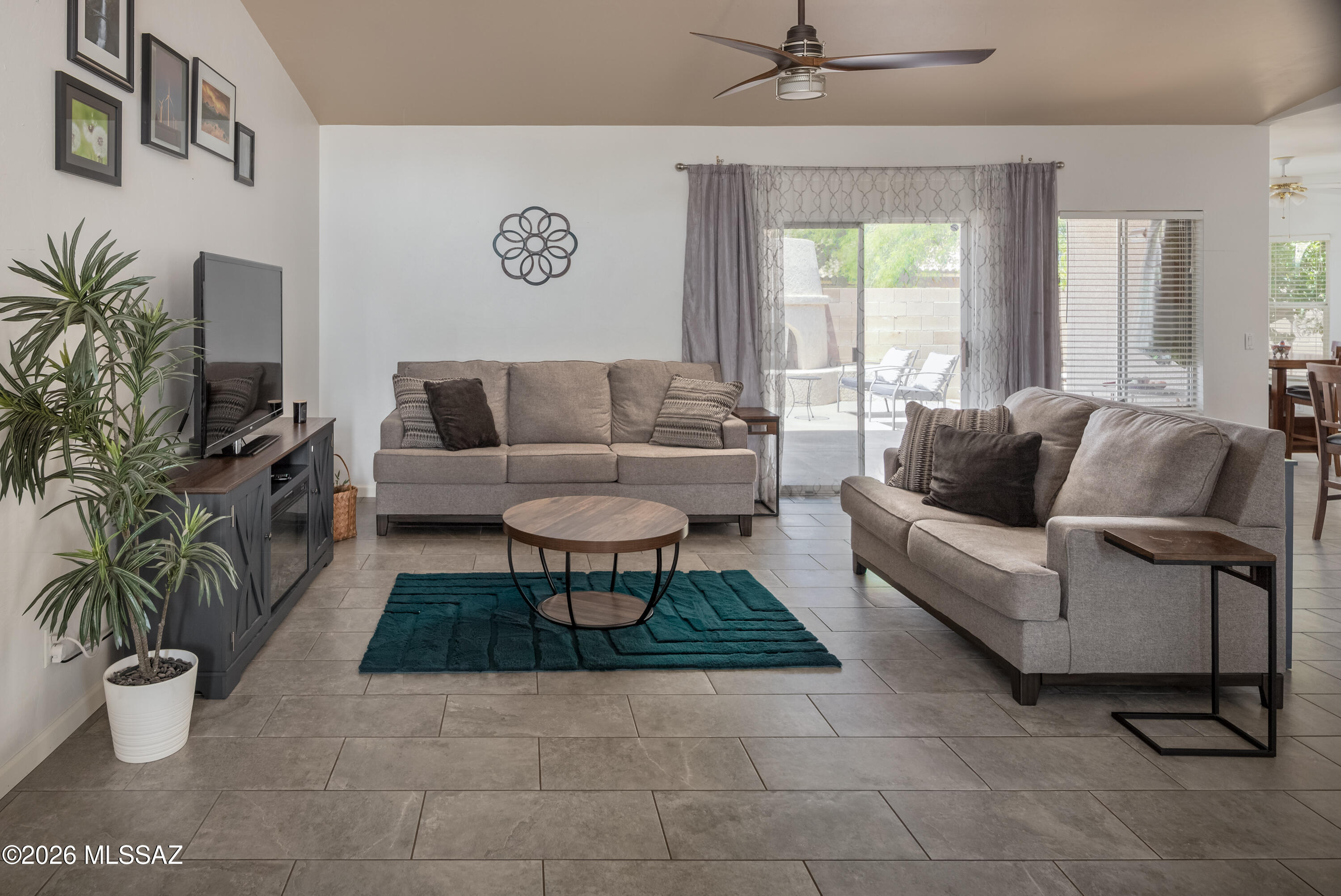 7140 West Maple Ridge Drive Tucson, AZ 85743 - Photo 3 of 33 Open living room/great room off kitchen.