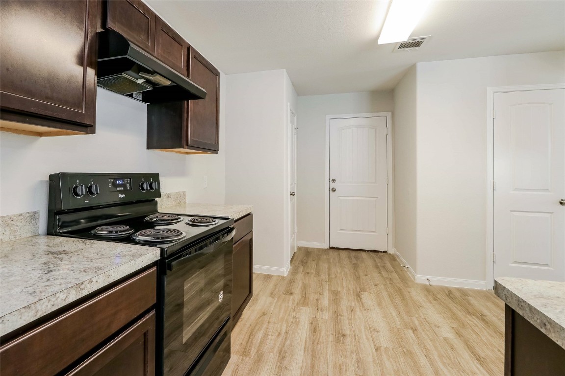 13806 Spring Meadows Circle Willis, TX 77378 - Photo 5 of 10 Photos may be representative of the floor plan and not the exact home. Finishes, layout, and features of the actual property for lease may vary.