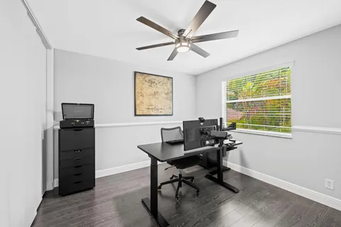 a view of a workspace with furniture
