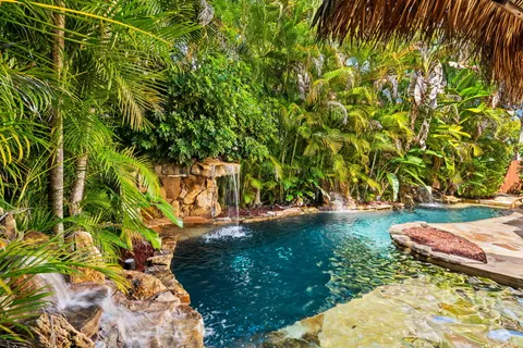 a backyard of a house with lots of green space