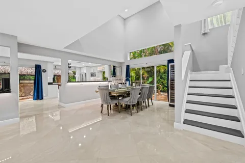 a room with furniture and flat screen tv