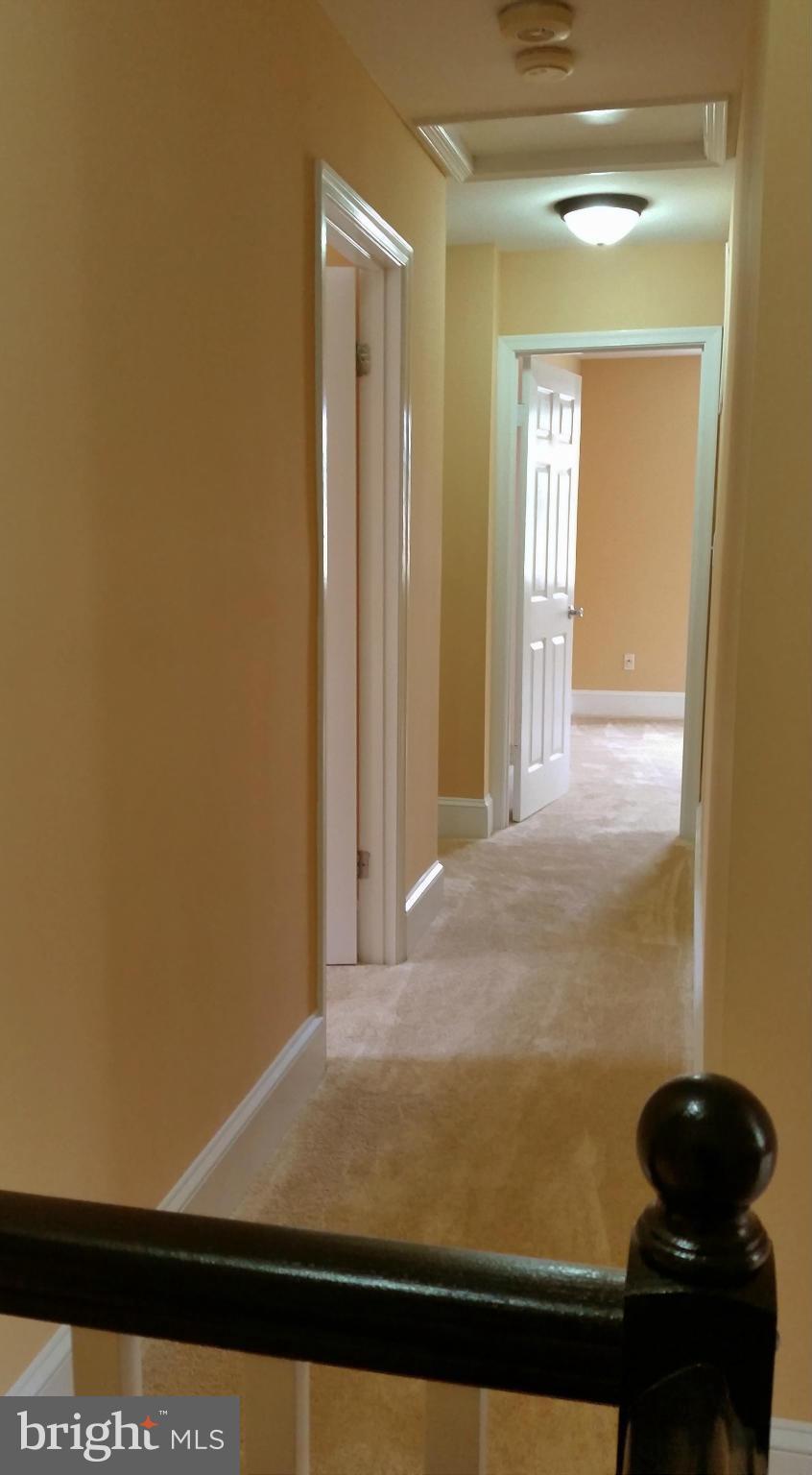 8611 Dunbrook Lane Laurel, MD 20708 - Photo 12 of 30 Second level hallway