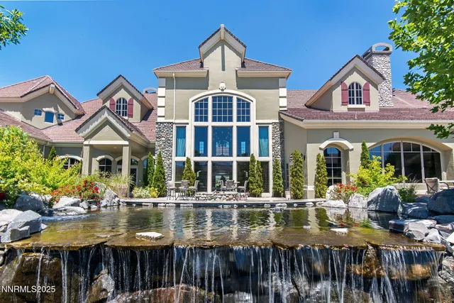 a front view of houses with a swimming pool