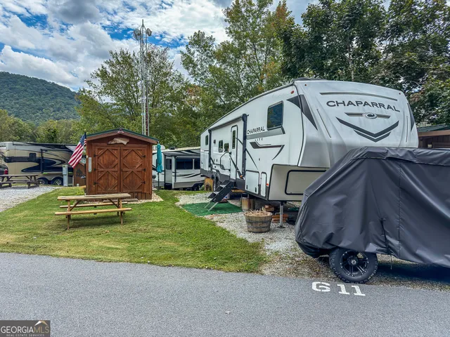 a view of a backyard with a sink and a slide