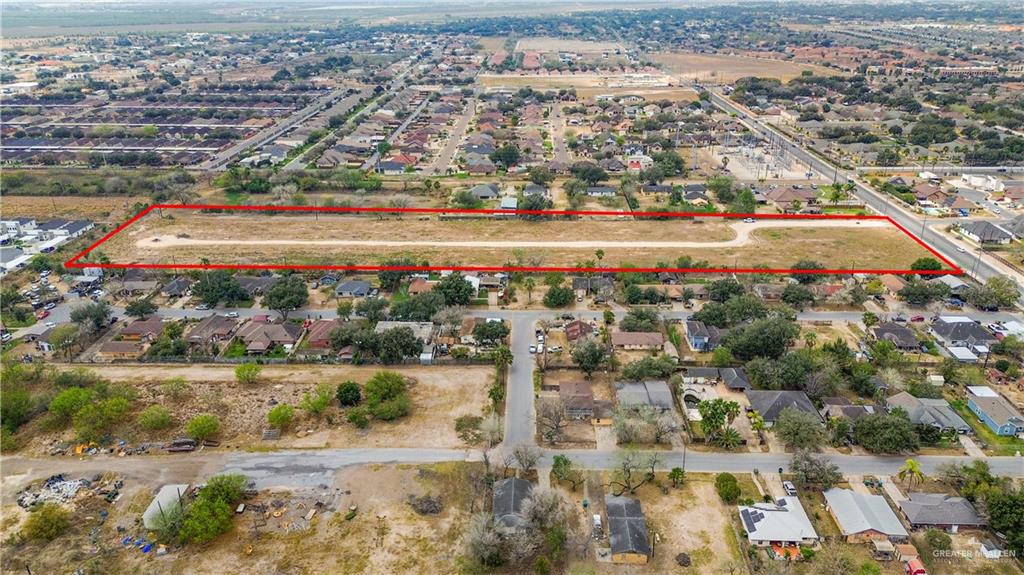 1201 West Hall Acres Road Pharr, TX 78577 - Photo 3 of 5 an aerial view of residential building and lake view