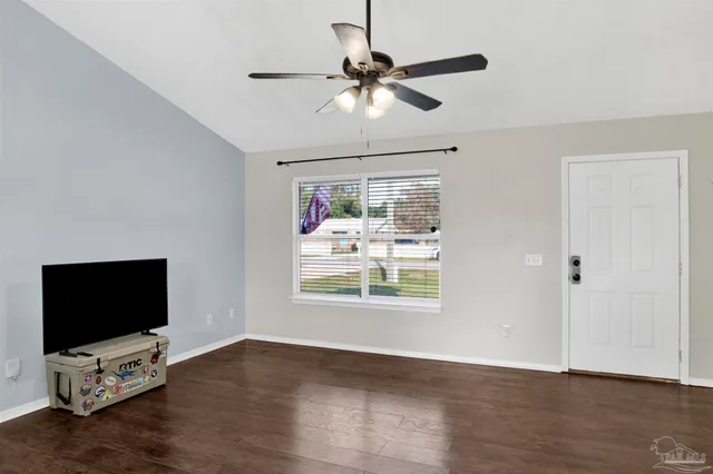 a view of livingroom with hardwood floor and window