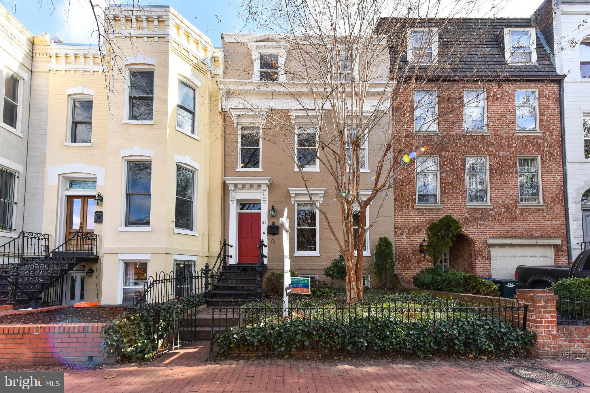 a front view of a multi story residential apartment building