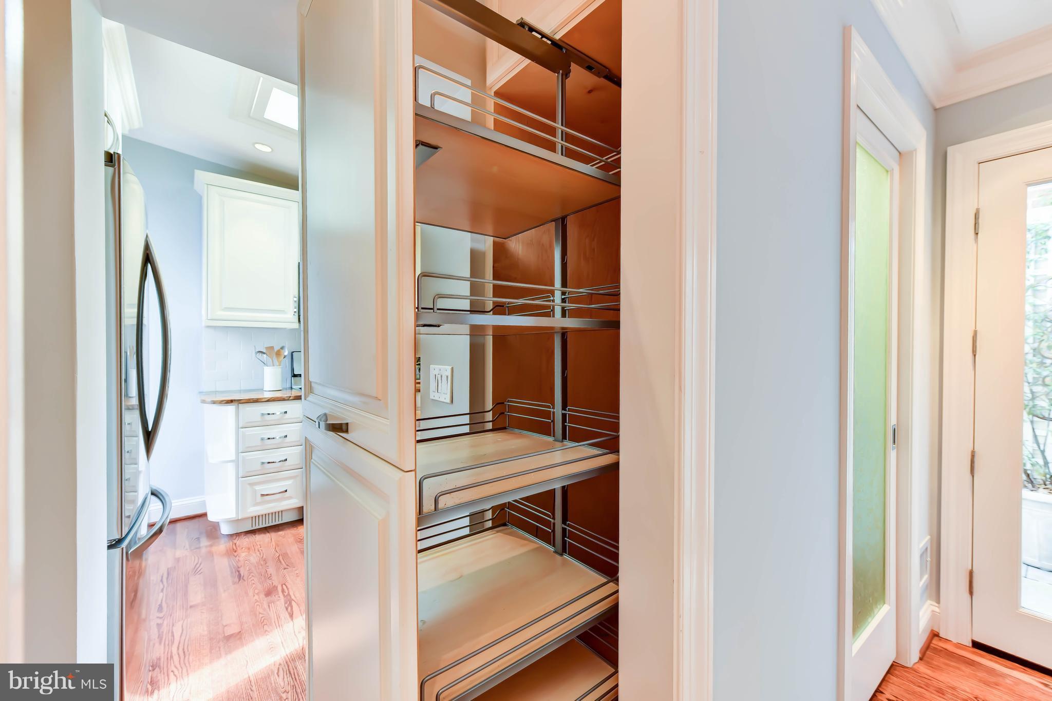 21 3rd Street Northeast Washington, DC 20002 - Photo 12 of 29 a view of kitchen and utility room with wooden floor