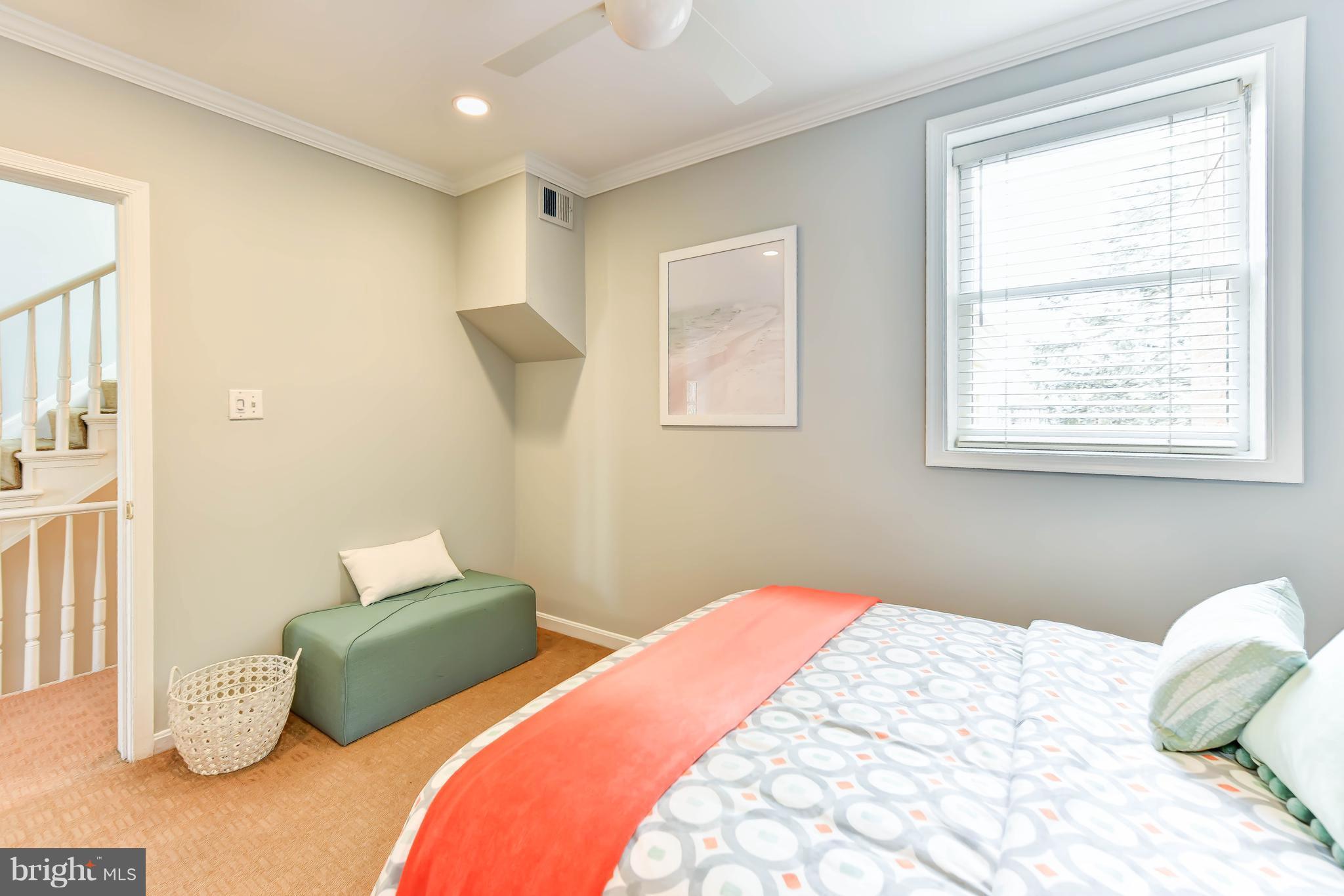 21 3rd Street Northeast Washington, DC 20002 - Photo 18 of 29 a bedroom with bed and a window