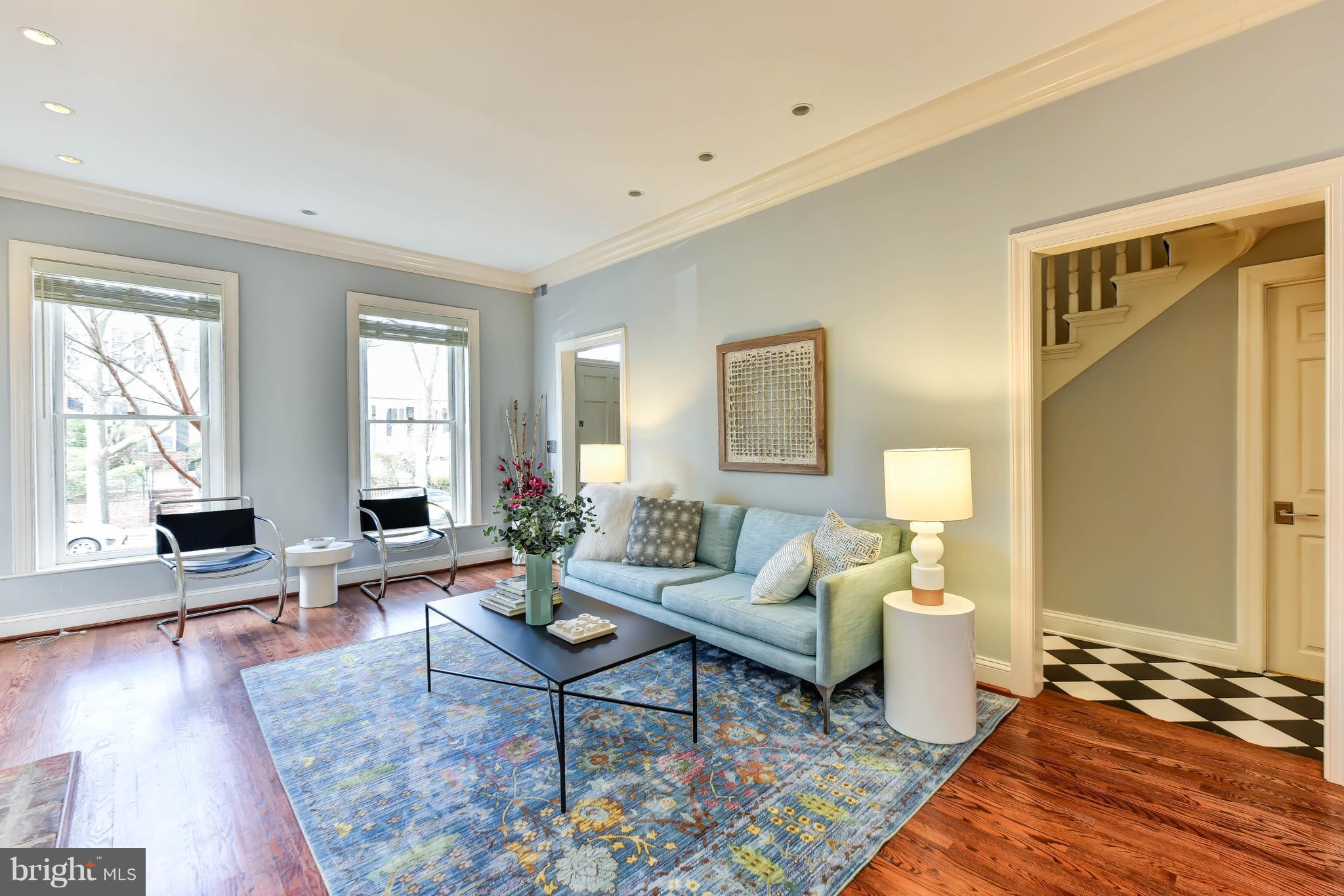 21 3rd Street Northeast Washington, DC 20002 - Photo 5 of 29 a living room with furniture or couch and a window